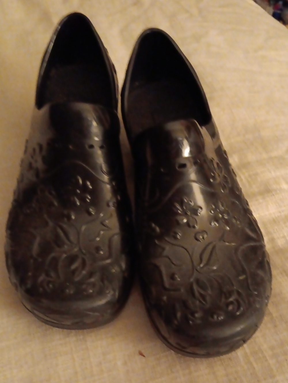 Dansko Black Floral-Embossed Slip-On Clogs